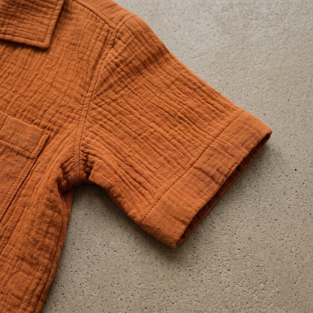 Rust double-cloth muslin fabric close-up